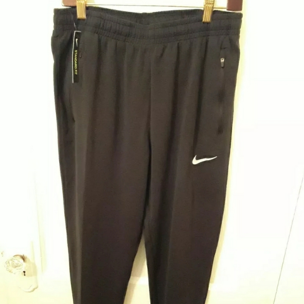 Nike running tapered jogger pants Medium